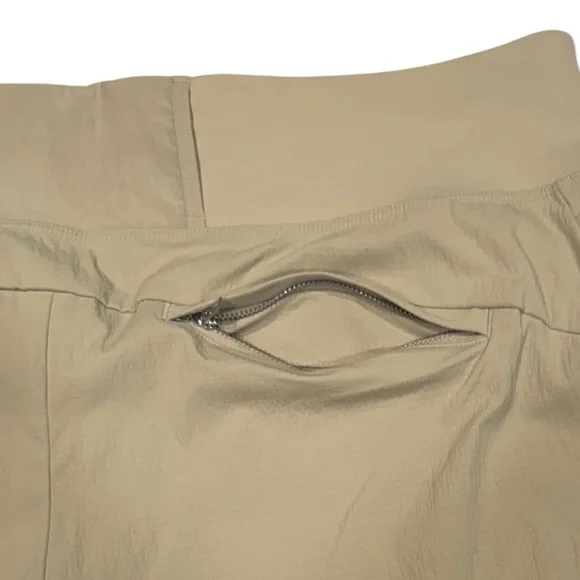 ATHLETA Trekkie North Short UPF Secure Pockets Tan Neutral NWT 16 - Picture 8 of 13